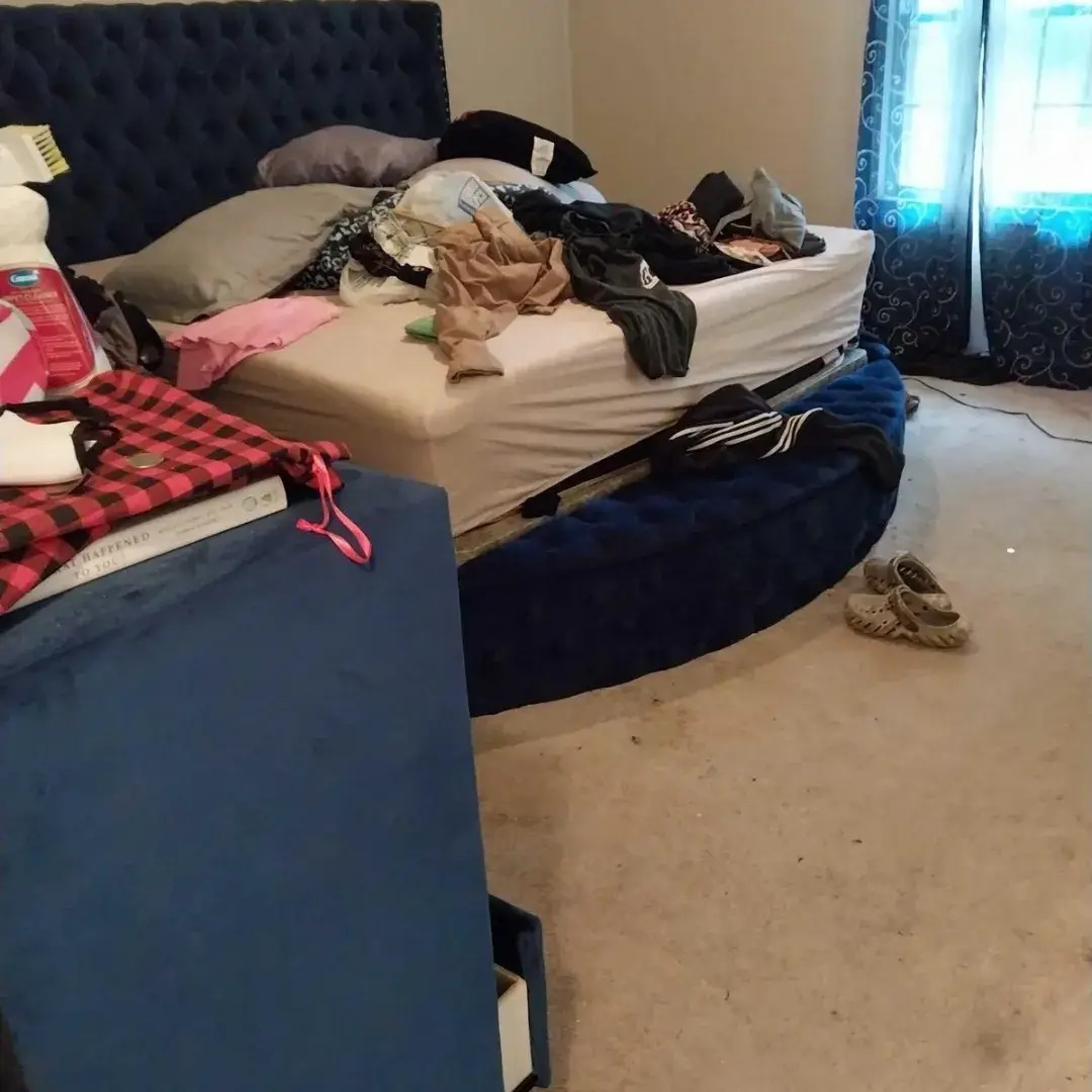Messy master bedroom before deep cleaning in McDonough, GA