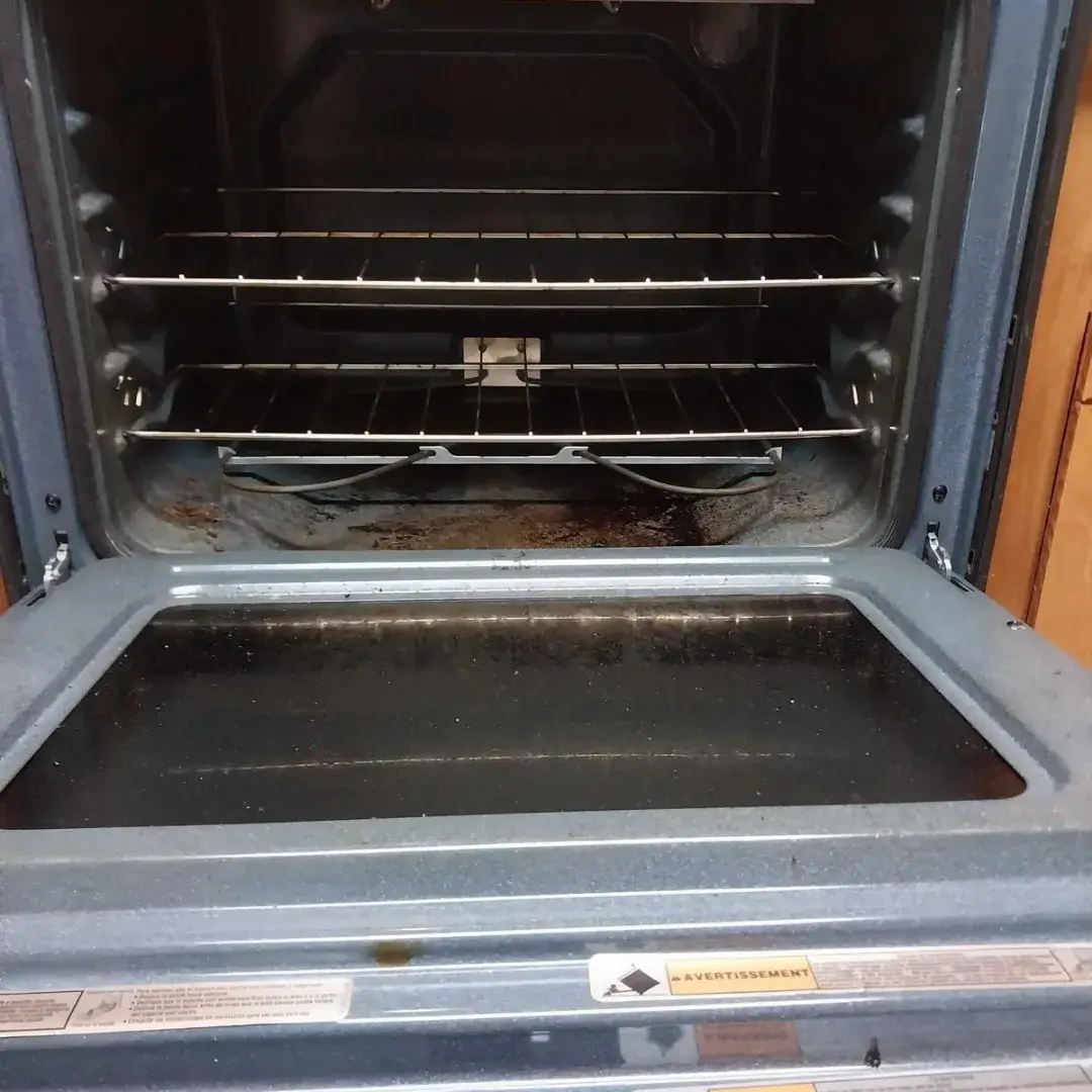 Dirty oven interior before professional cleaning in McDonough, GA